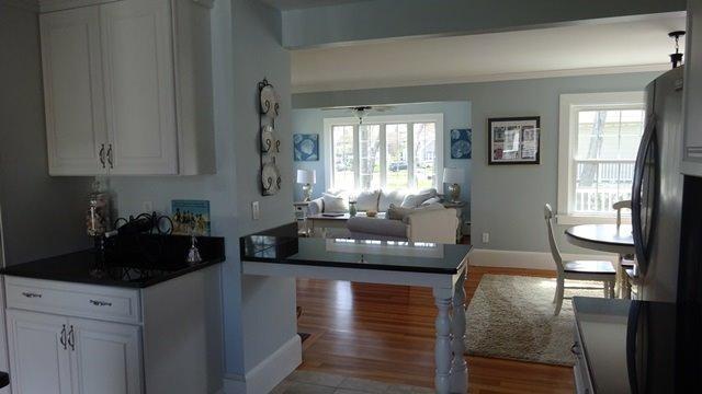 54 Jefferson Shores Road Buzzards Bay, MA 02532 - Photo 11 of 28 a living room with furniture and a large window