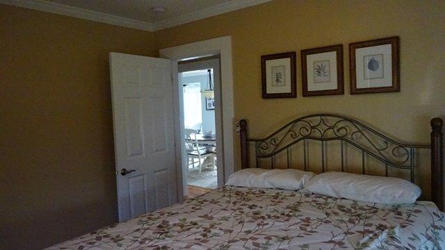 54 Jefferson Shores Road Buzzards Bay, MA 02532 - Photo 15 of 28 a bedroom with a bed and a window