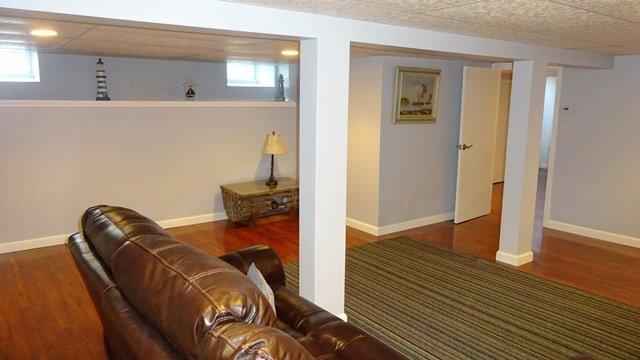 54 Jefferson Shores Road Buzzards Bay, MA 02532 - Photo 17 of 28 a view of a livingroom with furniture and wooden floor