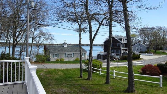 54 Jefferson Shores Road Buzzards Bay, MA 02532 - Photo 19 of 28 a front view of a house with garden