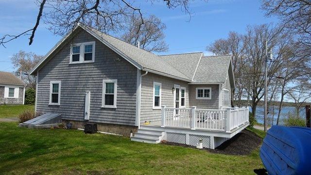 54 Jefferson Shores Road Buzzards Bay, MA 02532 - Photo 23 of 28 a view of house with a yard