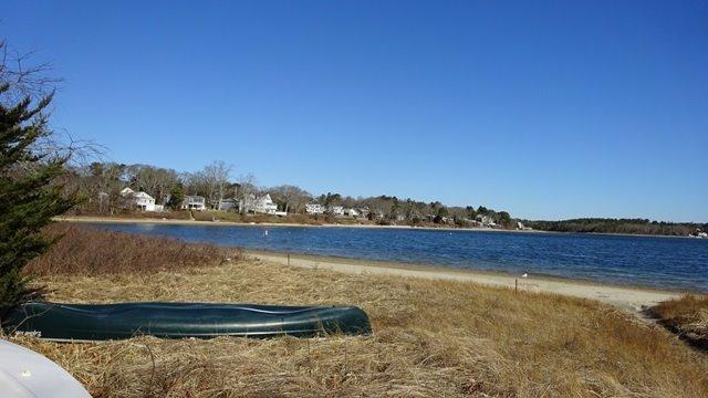54 Jefferson Shores Road Buzzards Bay, MA 02532 - Photo 25 of 28 a view of an ocean with a mountain