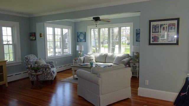 54 Jefferson Shores Road Buzzards Bay, MA 02532 - Photo 4 of 28 a living room with furniture and a potted plant