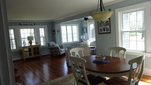 54 Jefferson Shores Road Buzzards Bay, MA 02532 - Photo 7 of 28 a view of a dining room with furniture window and wooden floor