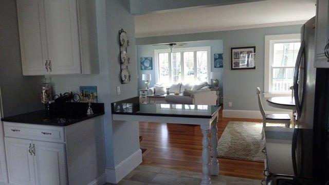 54 Jefferson Shores Road Buzzards Bay, MA 02532 - Photo 10 of 28 a kitchen with a refrigerator and window