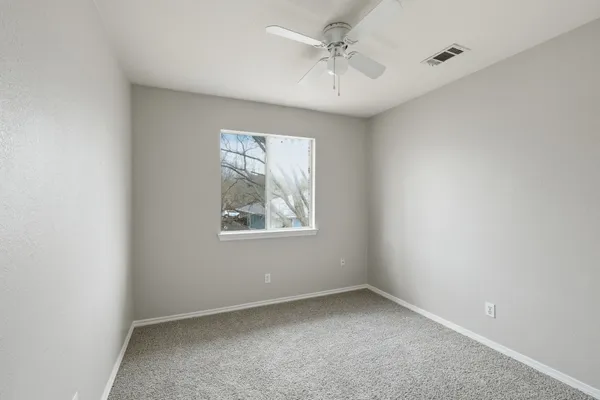 an empty room with a window