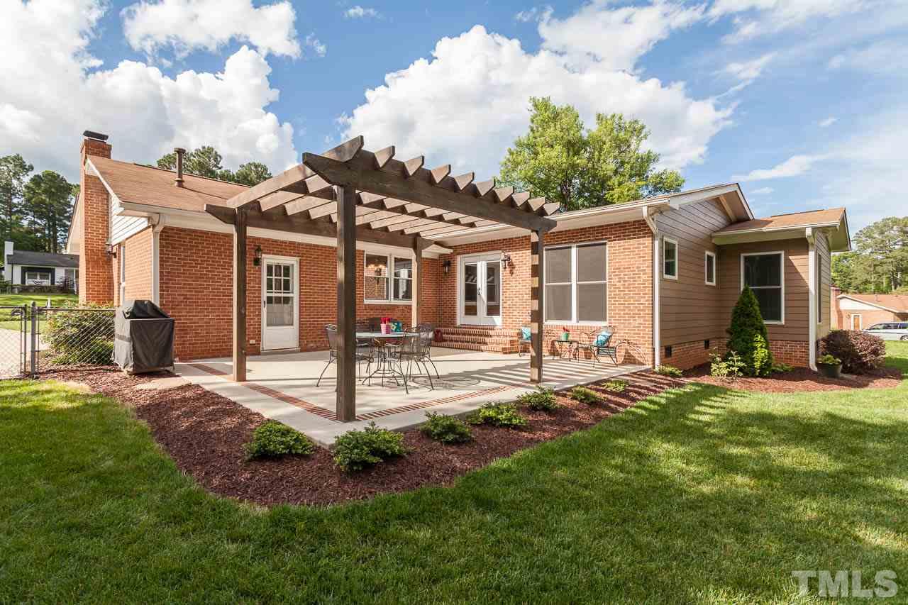 3145 Merrianne Drive Raleigh, NC 27607 - Photo 2 of 25 a front view of a house with a yard