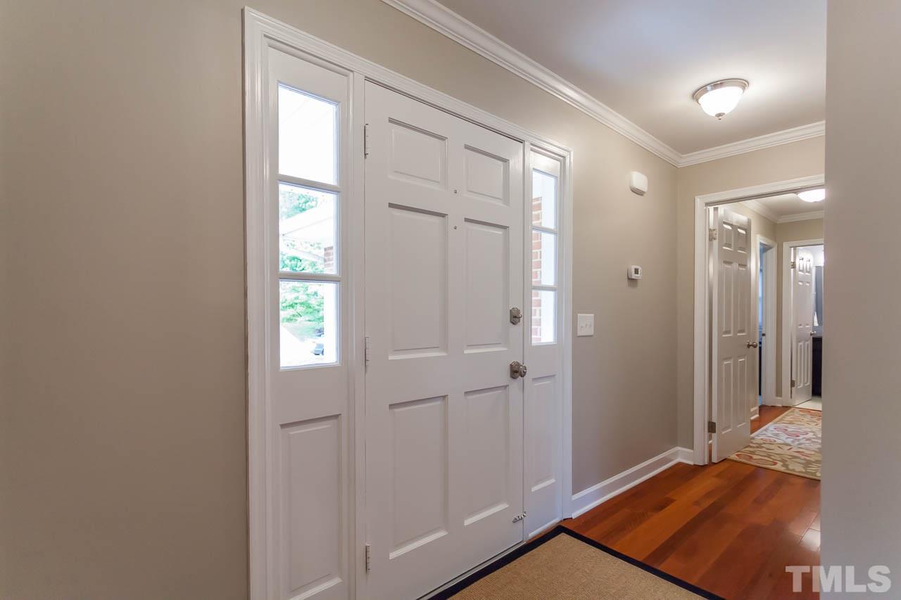 3145 Merrianne Drive Raleigh, NC 27607 - Photo 3 of 25 a view of a room that has a bed
