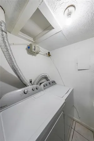 a kitchen with a stove and a microwave