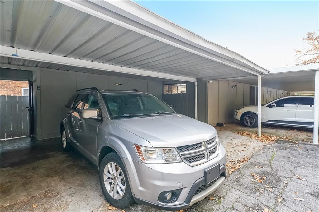 400 Winding River Drive, Unit E Atlanta, GA 30350 - Photo 33 of 34 a car parked in garage