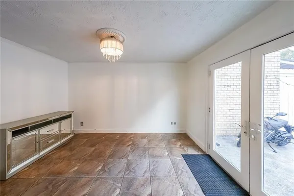 a view of an empty room and window