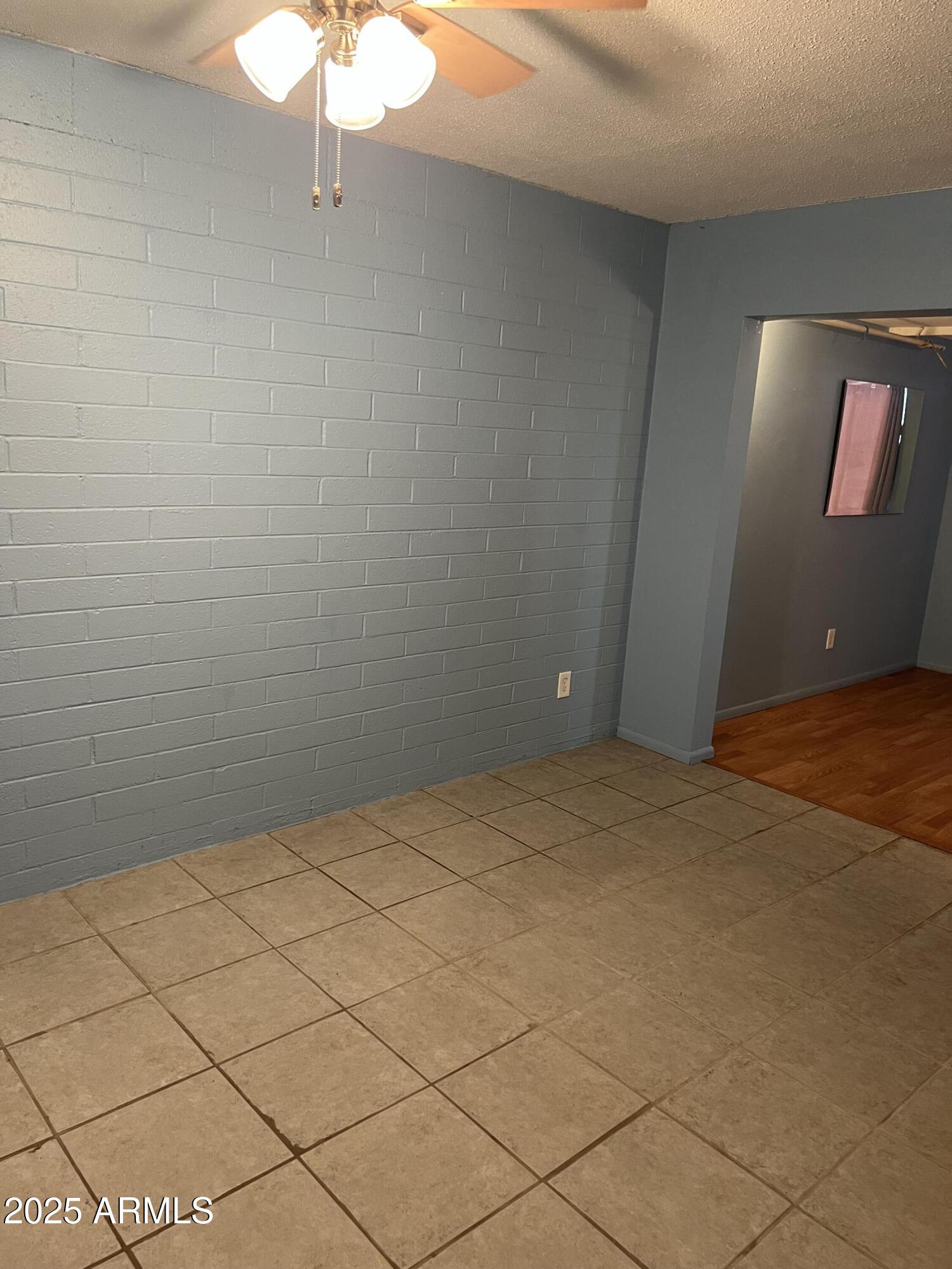 2530 West Berridge Lane, Unit E102 Phoenix, AZ 85017 - Photo 13 of 15 a view of an empty room