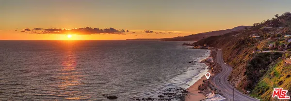 a view of lake and mountain