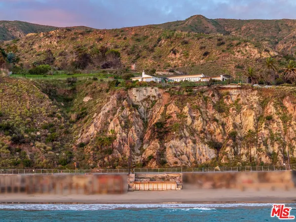 a view of lake with mountain