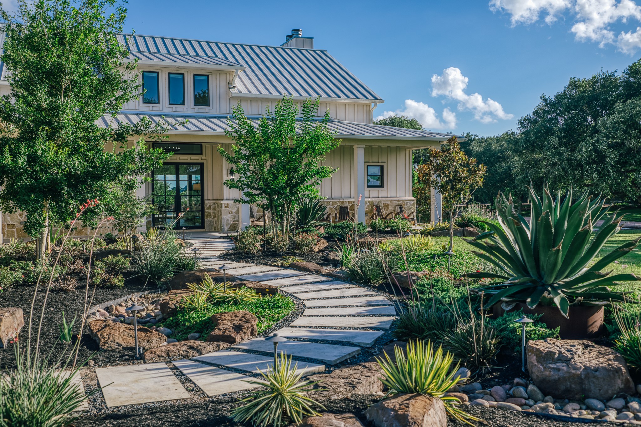 1034 Hilbun Road New Ulm, TX 78950 - Photo 17 of 49 Beautiful entry with extensive landscaping