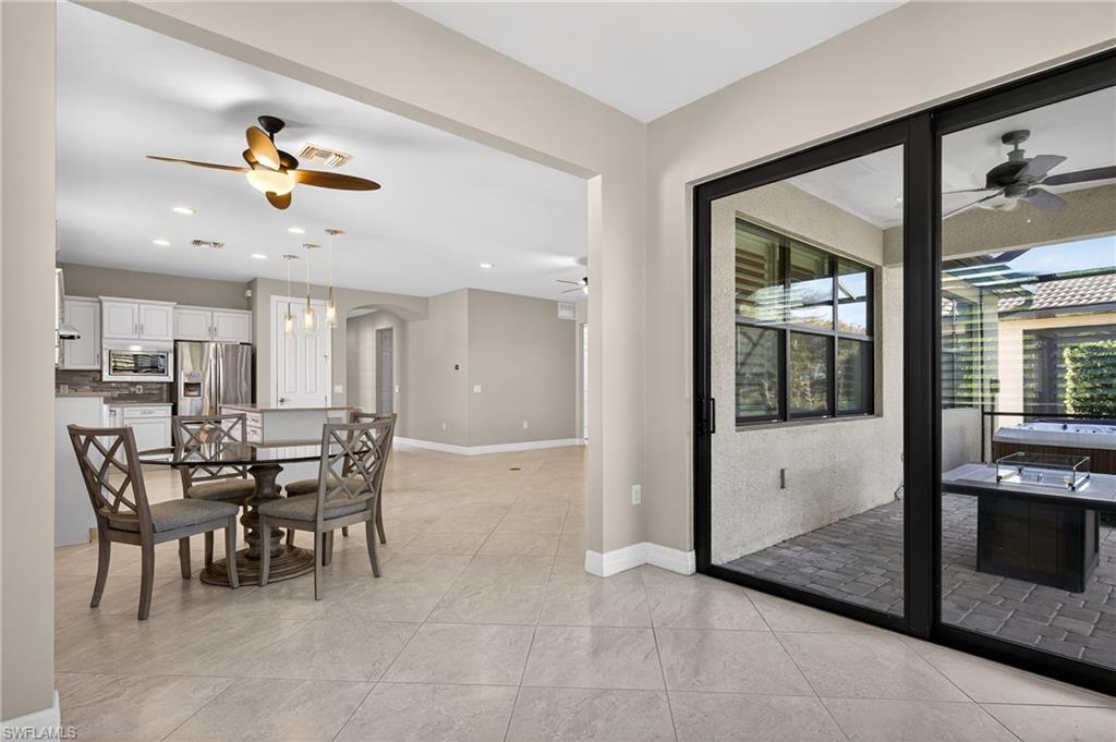 6345 Liberty Street Ave Maria, FL 34142 - Photo 13 of 35 a view of a dining room with furniture