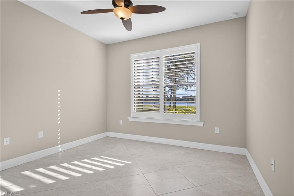 6345 Liberty Street Ave Maria, FL 34142 - Photo 24 of 35 a view of an empty room with a window