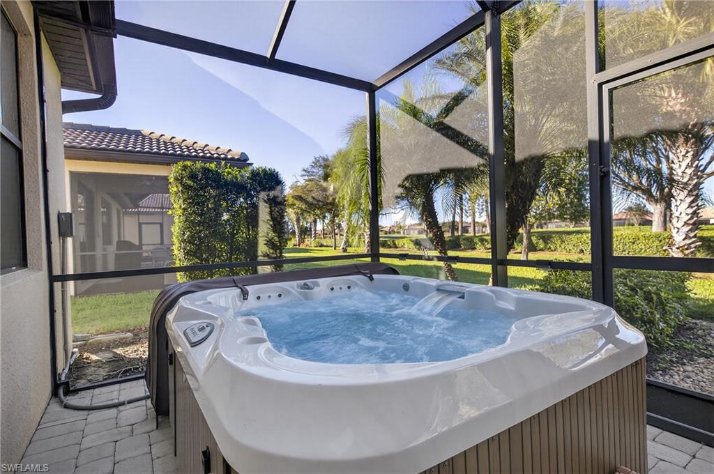 6345 Liberty Street Ave Maria, FL 34142 - Photo 28 of 35 a view of outdoor space swimming pool and furniture