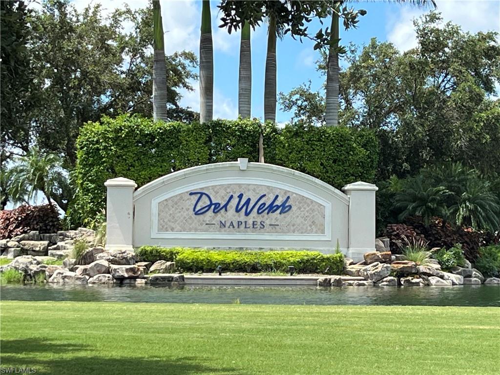 6345 Liberty Street Ave Maria, FL 34142 - Photo 34 of 35 a sign on the side of the road