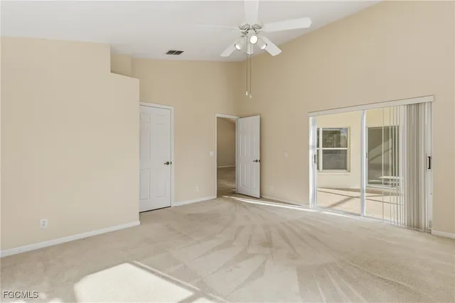 a bathroom with a shower a sink and a mirror