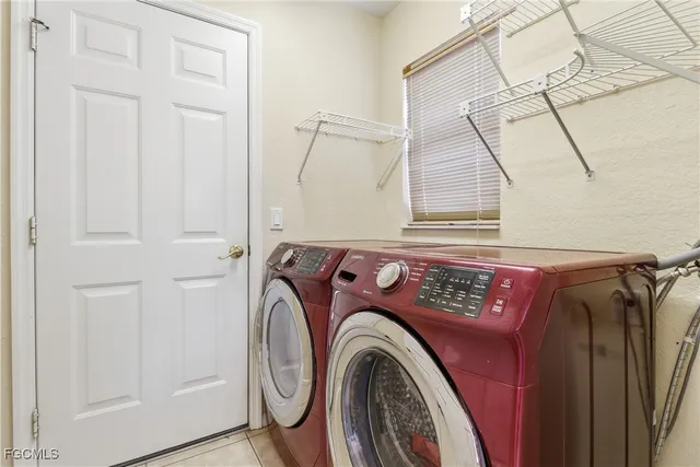 a view of a swimming pool and a back yard