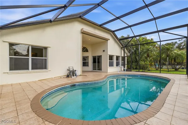 a view of a house with a swimming pool
