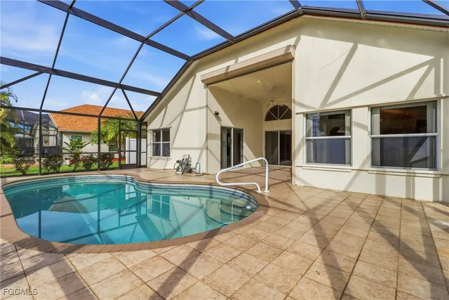 a front view of a house with a large window