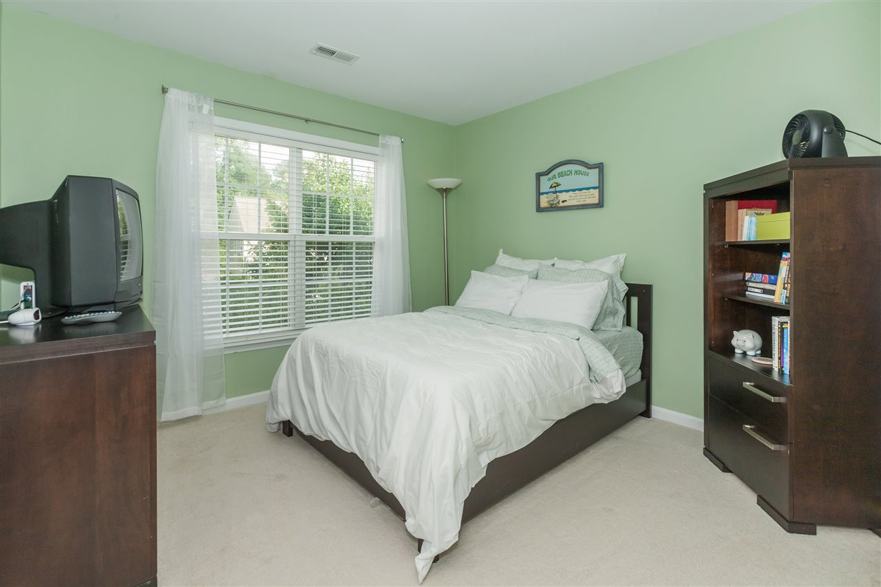 7613 Silver View Lane Raleigh, NC 27613 - Photo 17 of 25 One of three spacious secondary bedrooms. Bedroom