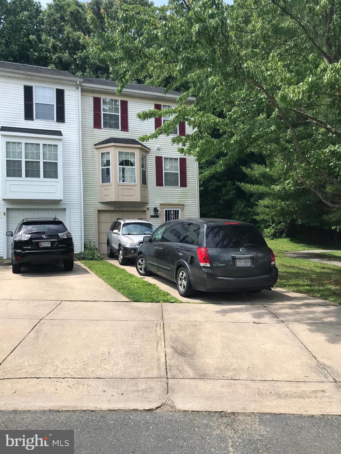 8501 Ritchboro Road District Heights, MD 20747 - Photo 1 of 17 a car parked in front of a house