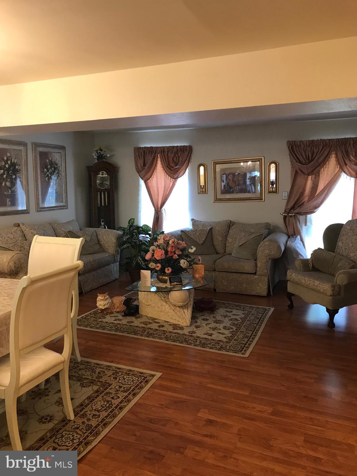 8501 Ritchboro Road District Heights, MD 20747 - Photo 14 of 17 a living room with furniture a rug and a window