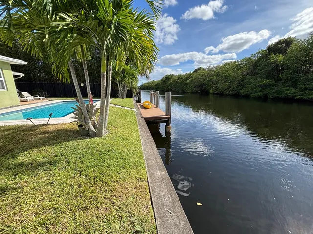 a view of a back yard of the house