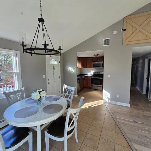a view of a dining room with furniture