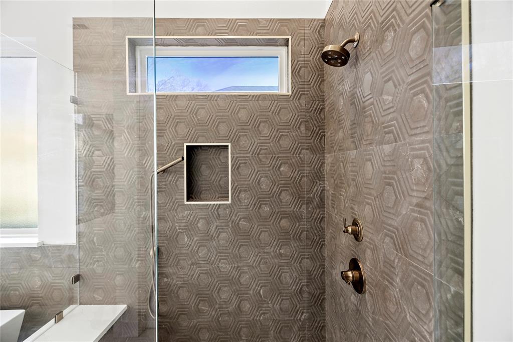 2432 Bellview Circle Tyler, TX 75709 - Photo 26 of 40 a bathroom with a shower and a sink