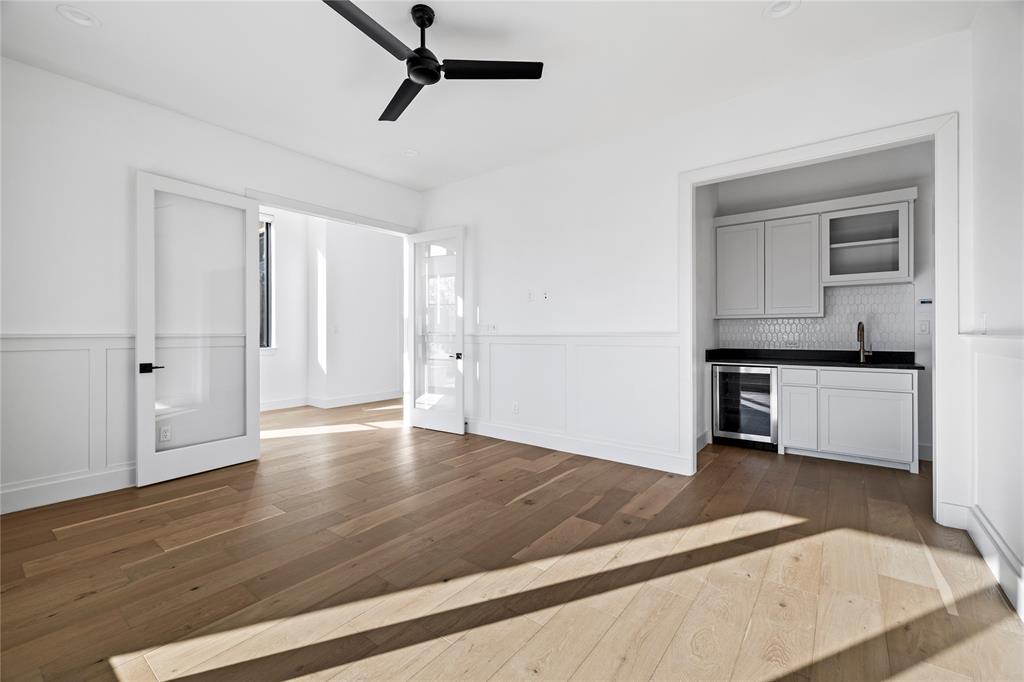2432 Bellview Circle Tyler, TX 75709 - Photo 27 of 40 a view of a kitchen with wooden floor and electronic appliances