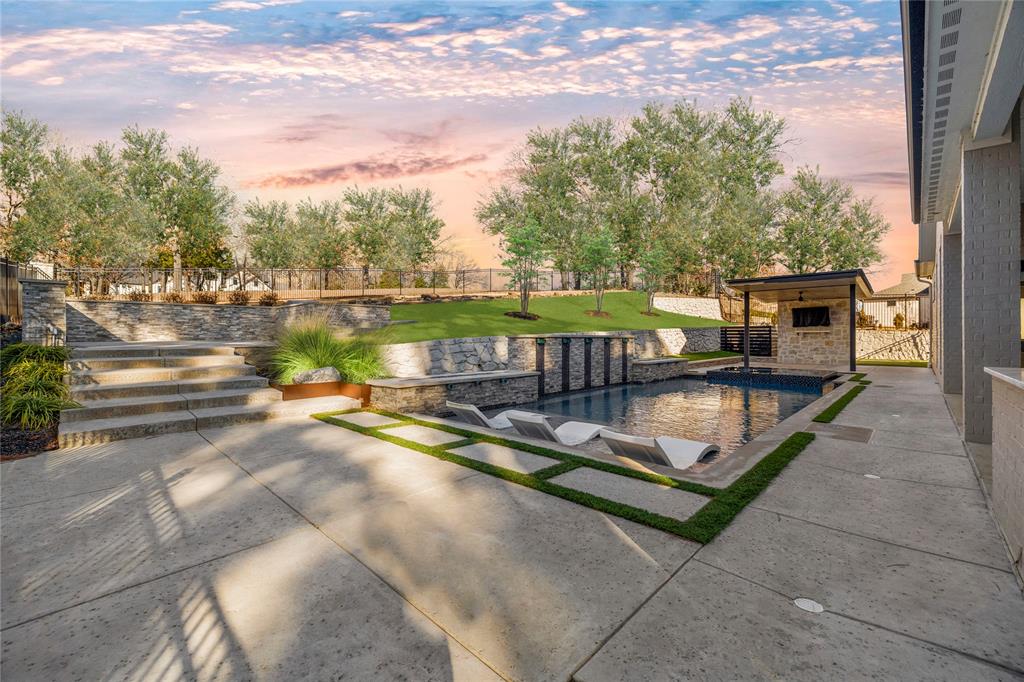 2432 Bellview Circle Tyler, TX 75709 - Photo 3 of 40 a view of swimming pool with a patio and a yard