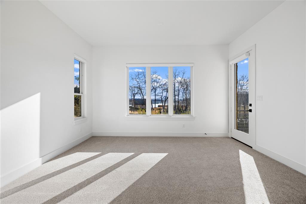 2432 Bellview Circle Tyler, TX 75709 - Photo 31 of 40 an empty room with windows