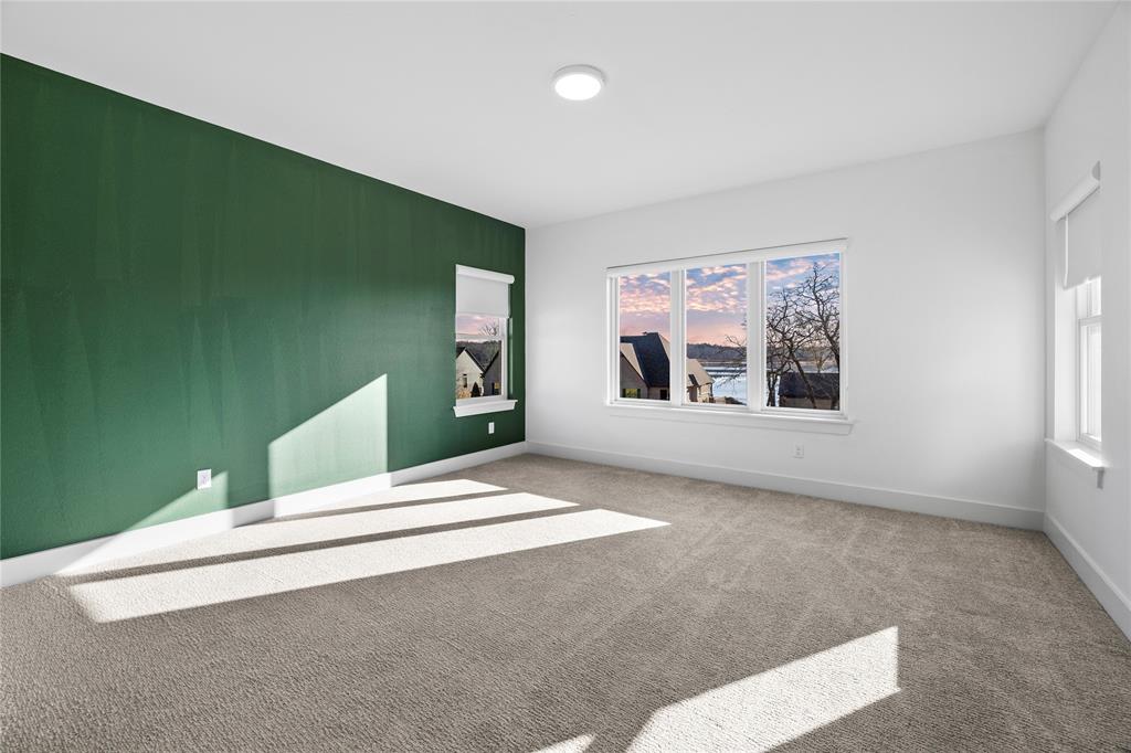 2432 Bellview Circle Tyler, TX 75709 - Photo 34 of 40 a bedroom with a bed and a window