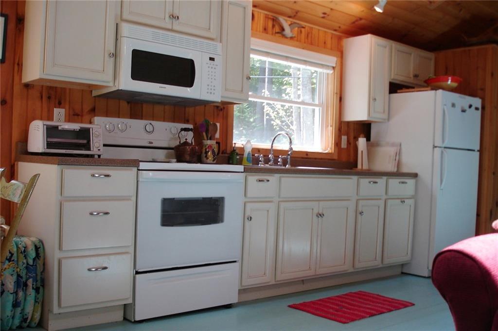 23 Ledgemere Road Orrs Island, ME 04066 - Photo 11 of 14 Another view of the kitchen and open...