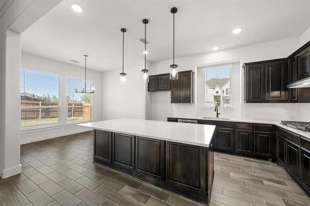 a bathroom with a sink a mirror and a bathtub