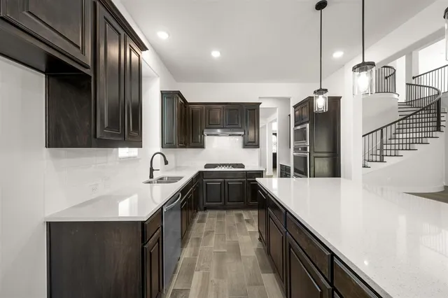 a spacious bathroom with a bathtub and shower