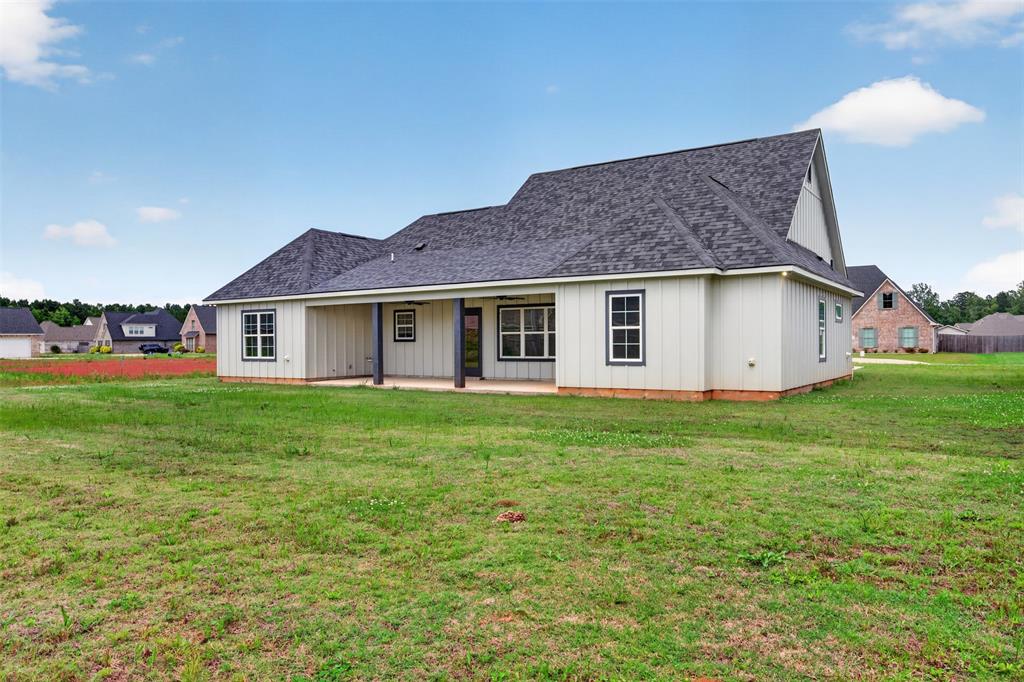127 Sitka Loop Haughton, LA 71037 - Photo 28 of 29 a view of a house with backyard