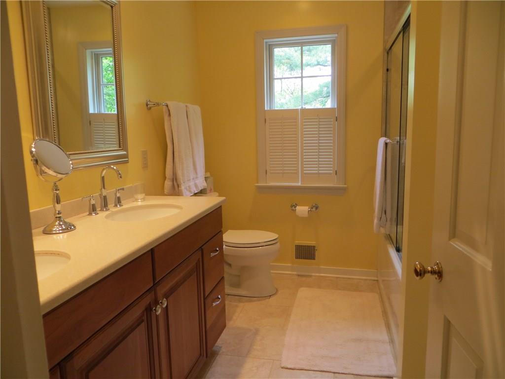 113 Tree Farm Road Fox Chapel, PA 15238 - Photo 18 of 22 Updated bathroom 3 features bathtub with shower.