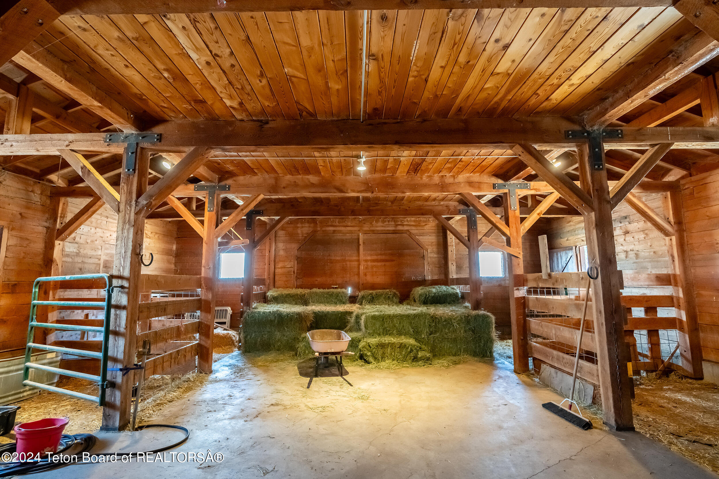 465 East Rigby Road Alta, WY 83414 - Photo 62 of 85 Horse Barn Interior