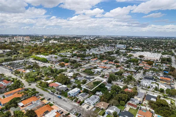 an aerial view of a city with lots of residential buildings
