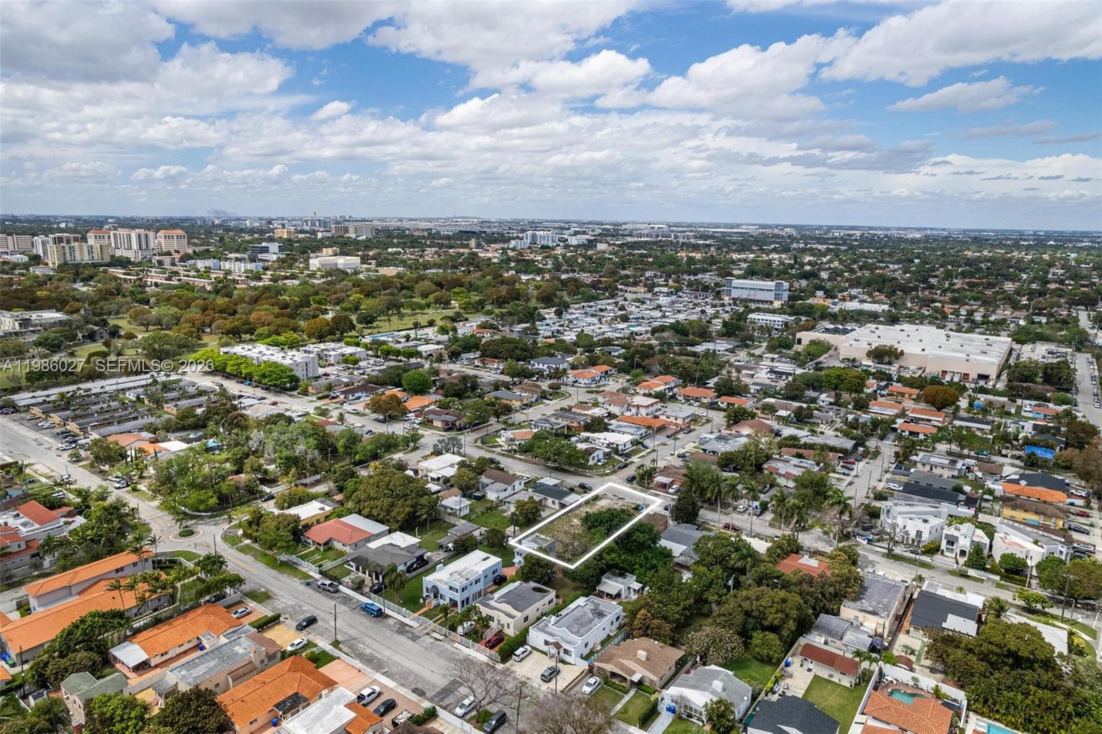 3056 Southwest 13th Street Miami, FL 33145 - Photo 8 of 11 an aerial view of a city with lots of residential buildings