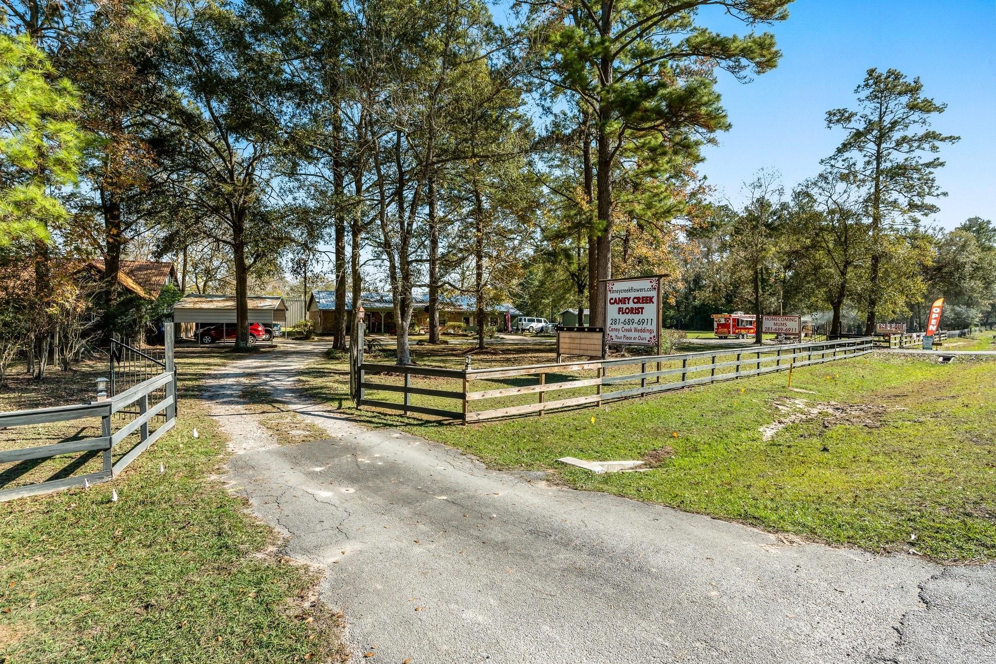 15091 Farm To Market 1485 Conroe, TX 77306 - Photo 18 of 28 a view of a park with large trees