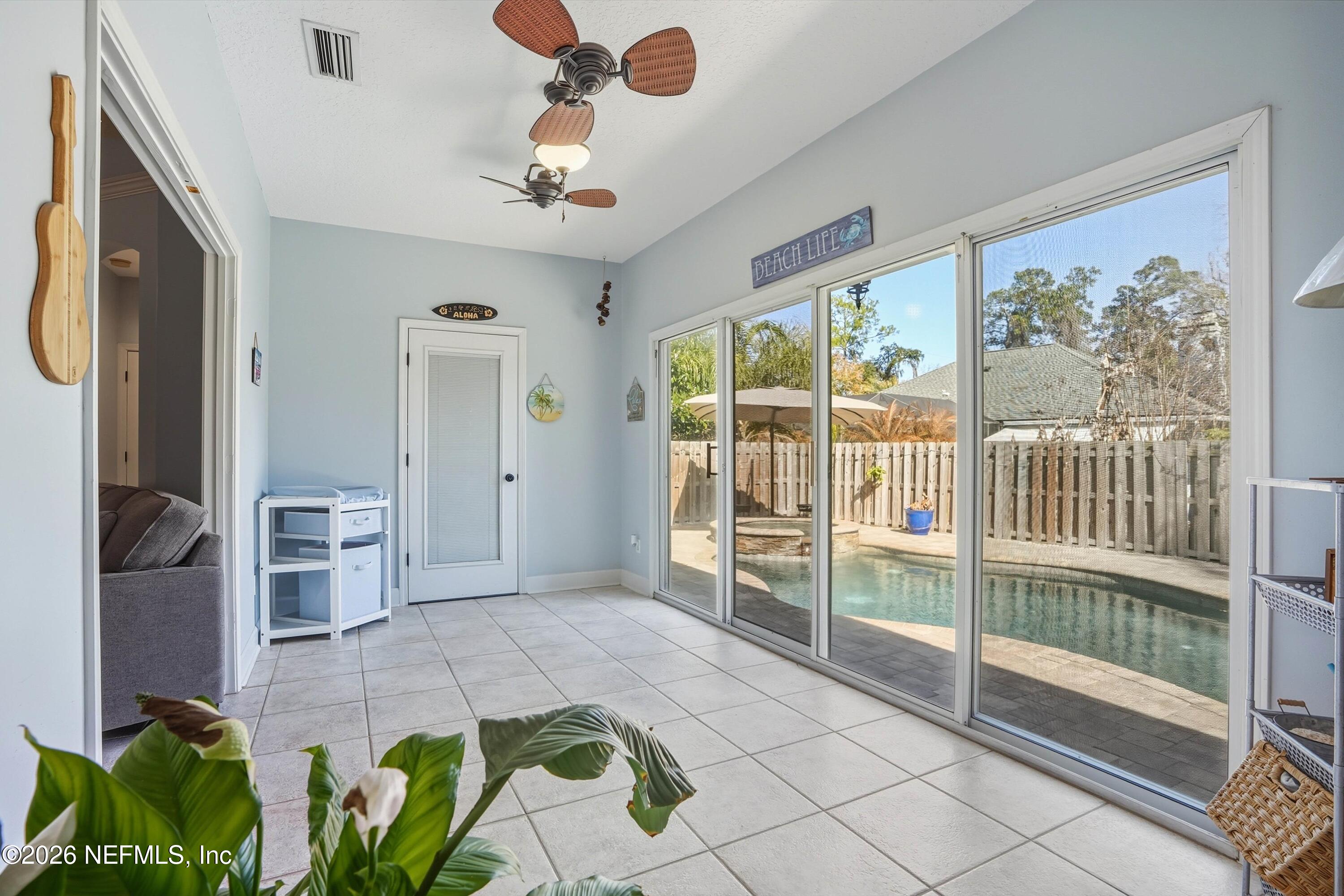 2918 Grande Oaks Way Fleming Island, FL 32003 - Photo 18 of 54 Sun Room