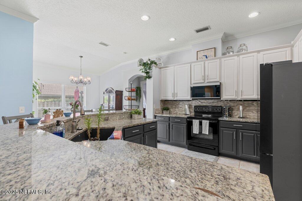2918 Grande Oaks Way Fleming Island, FL 32003 - Photo 53 of 82 Kitchen