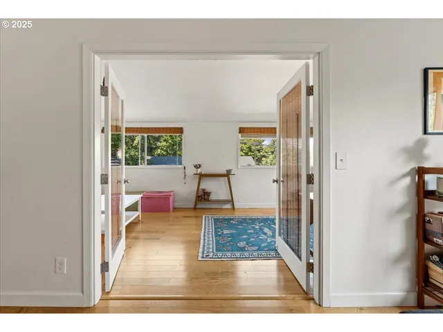 a view of a living room and bathroom