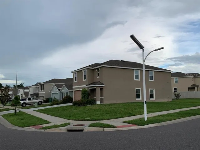 a house view with a garden space